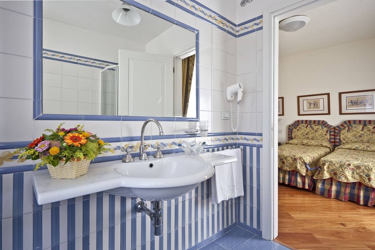 free toiletries, hair dryer, bidet, towels