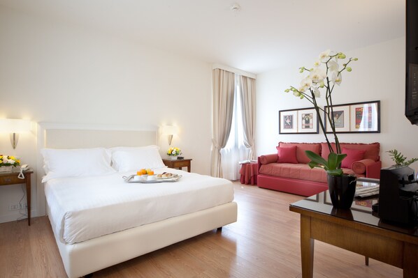 Ropa de cama de alta calidad y minibar 