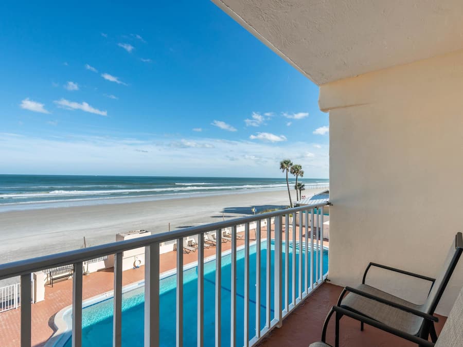 1 King, 2 Queens, Ocean Front, Non Smoking | Desk, laptop workspace, blackout drapes, iron/ironing board