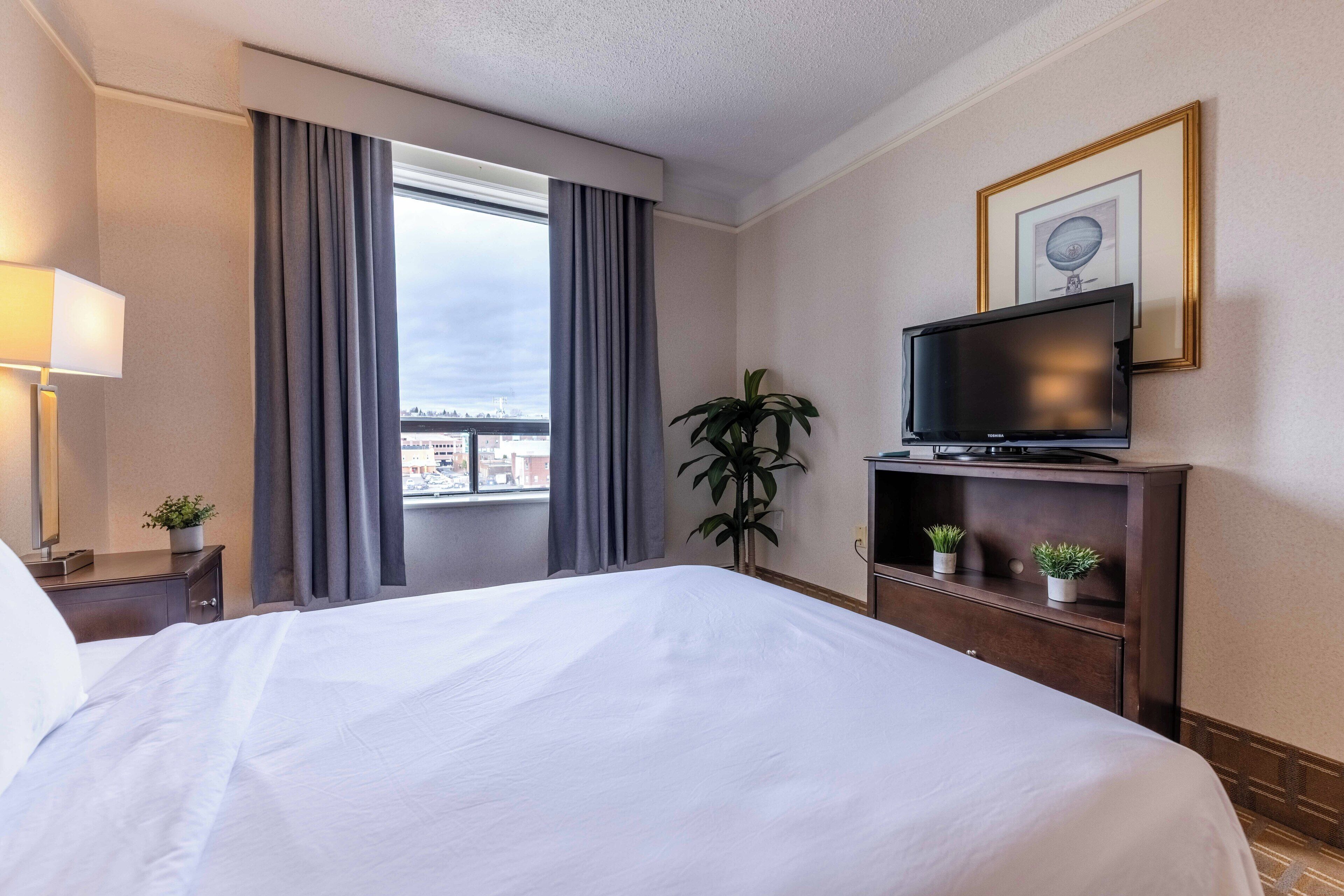 Junior Suite, 2 Queen Beds, City View | Desk, iron/ironing board, free WiFi, bed sheets