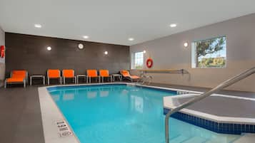 Indoor pool, open 7:00 AM to 10 PM, pool loungers