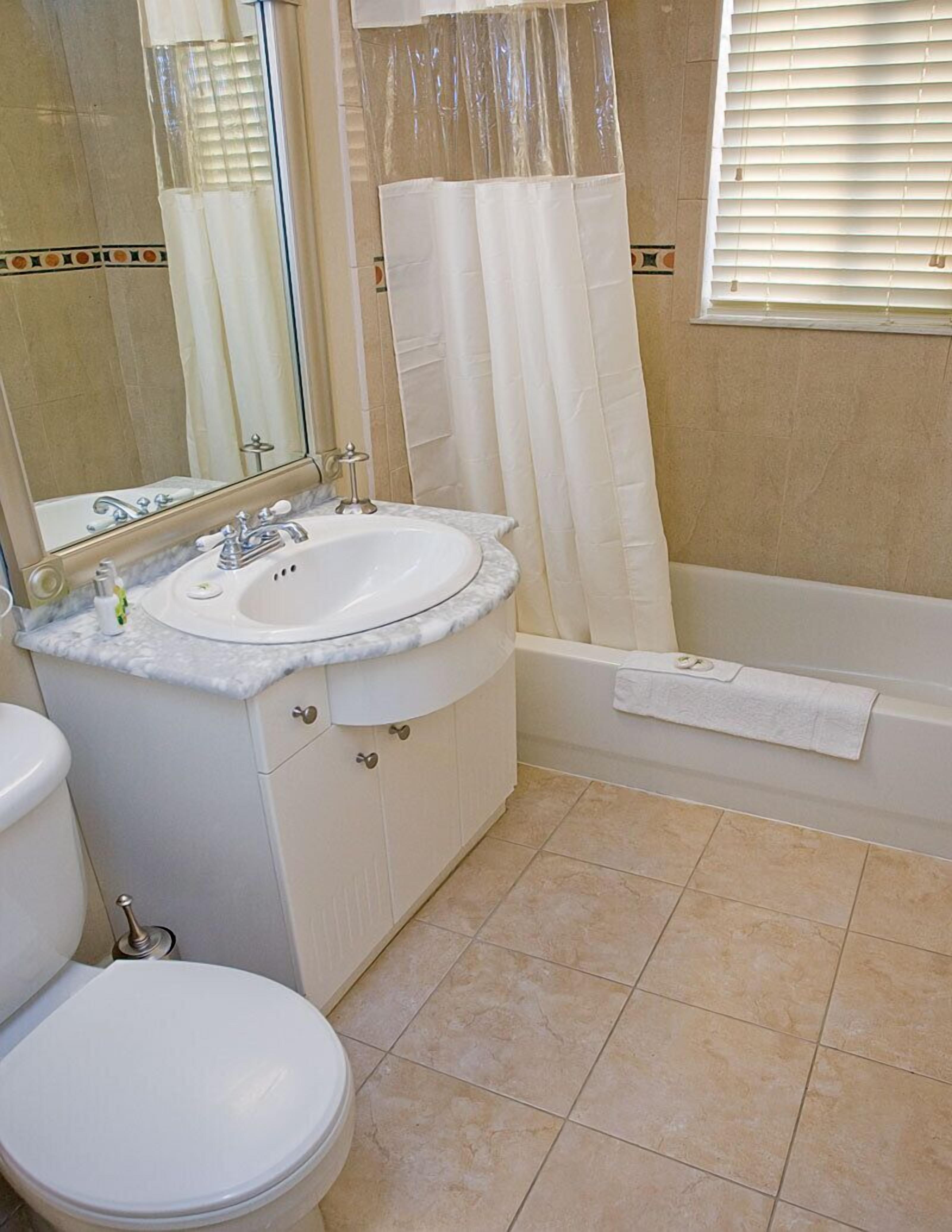 combined shower/bathtub, deep-soaking bathtub, free toiletries