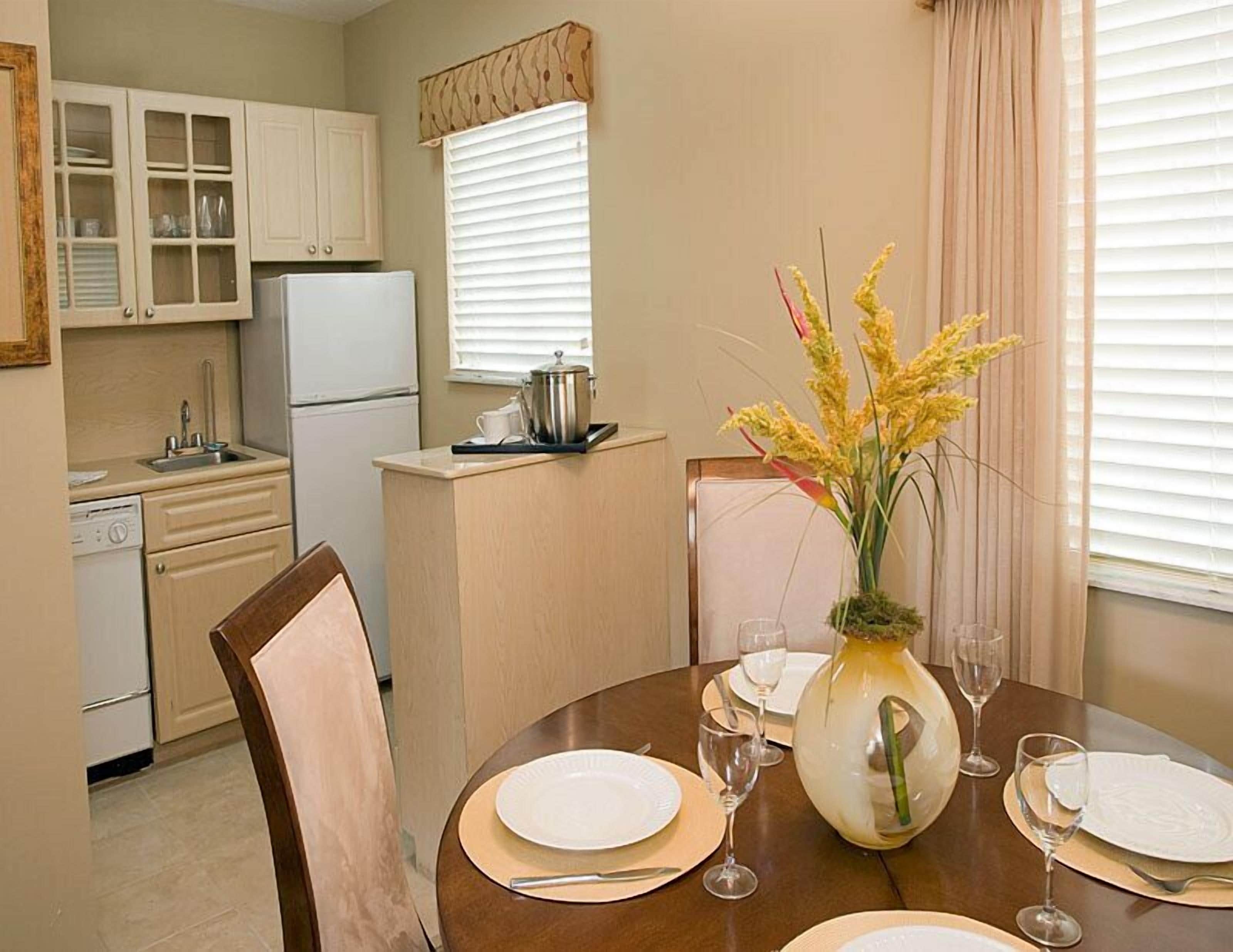 full-sized fridge, microwave, stovetop, dishwasher