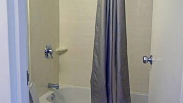 Combined shower/bathtub, hair dryer, towels