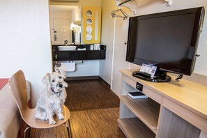 Laptop workspace, bed sheets