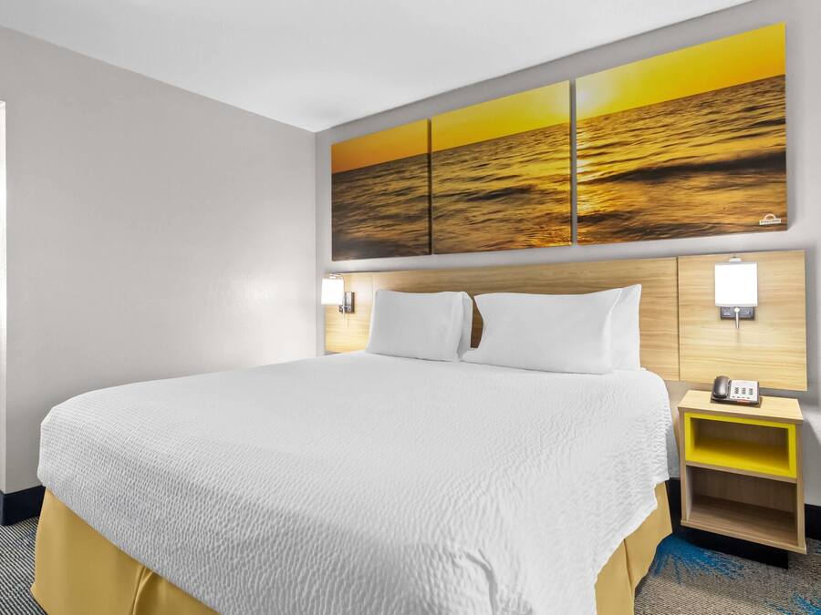 Desk, laptop workspace, blackout curtains, iron/ironing board