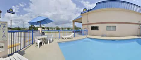 Seasonal outdoor pool, open 9 AM to 10 PM, sun loungers