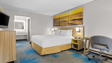 Desk, laptop workspace, blackout curtains, iron/ironing board