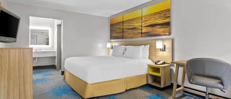 Desk, laptop workspace, blackout drapes, iron/ironing board