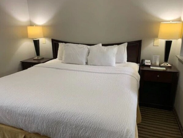 Desk, laptop workspace, blackout curtains, iron/ironing board