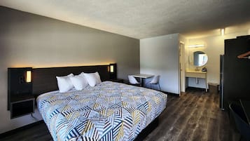 Desk, laptop workspace, blackout drapes, iron/ironing board