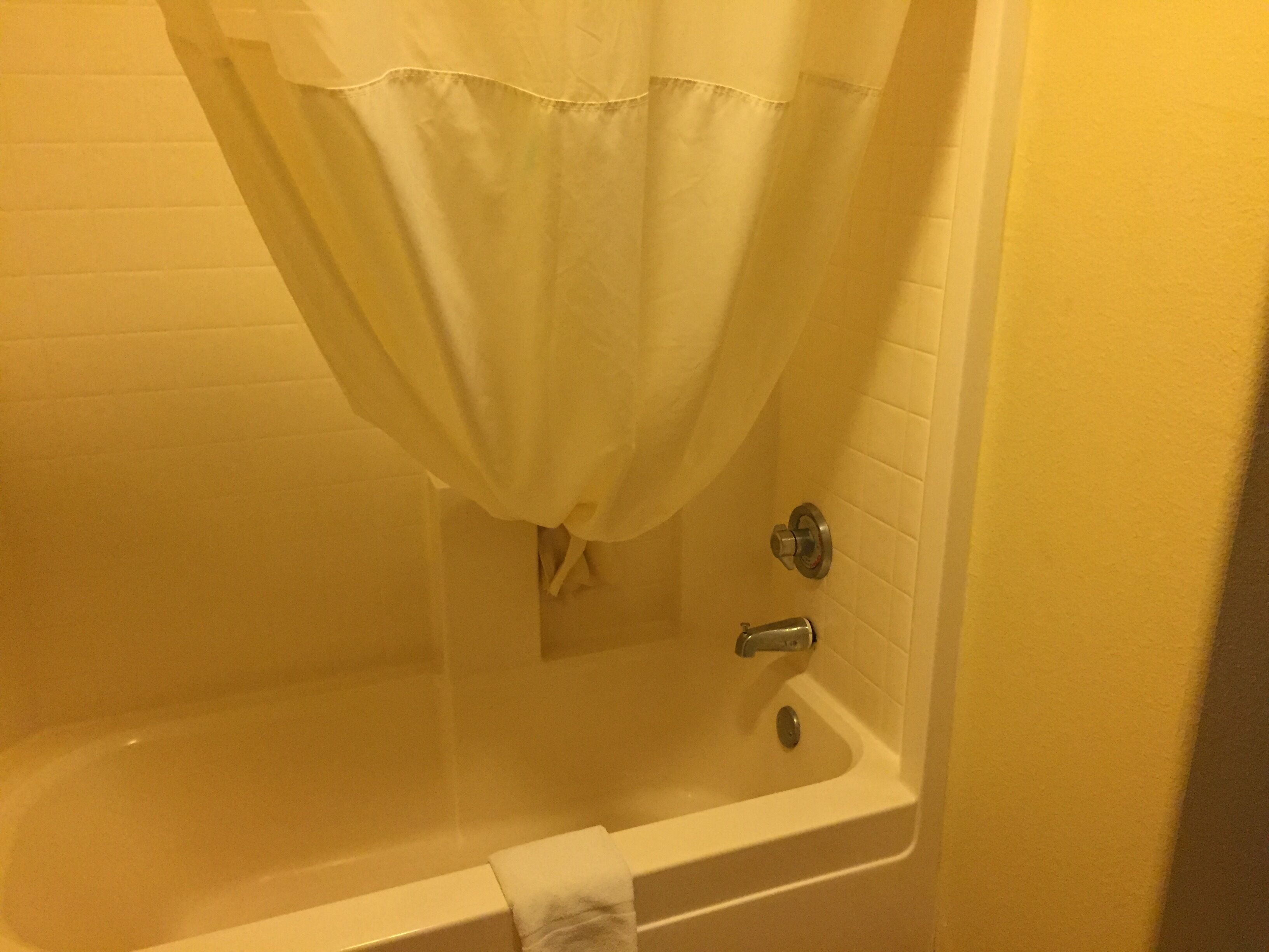 Standard Room, 2 Queen Beds | Bathroom | Combined shower/tub, hair dryer, towels