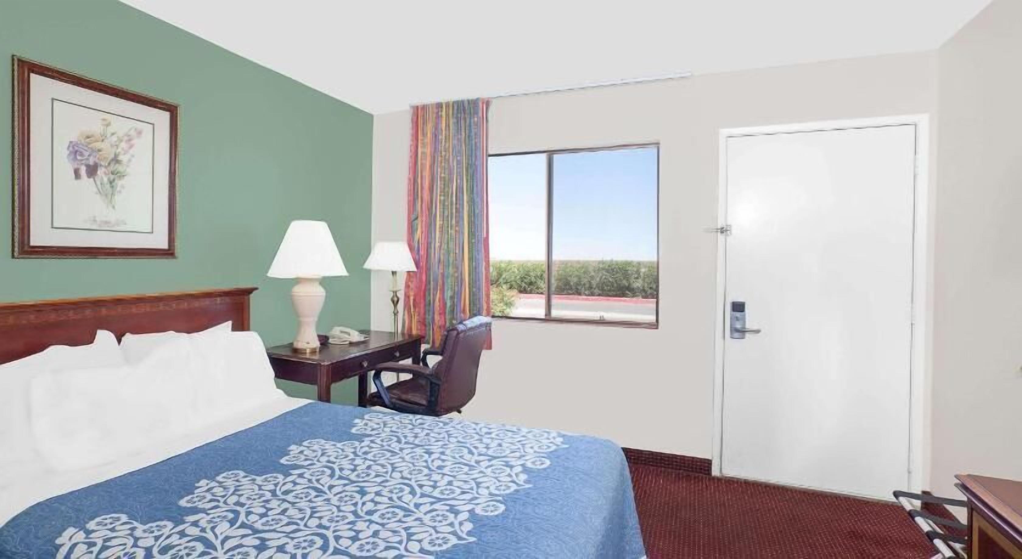 Desk, laptop workspace, iron/ironing board, rollaway beds