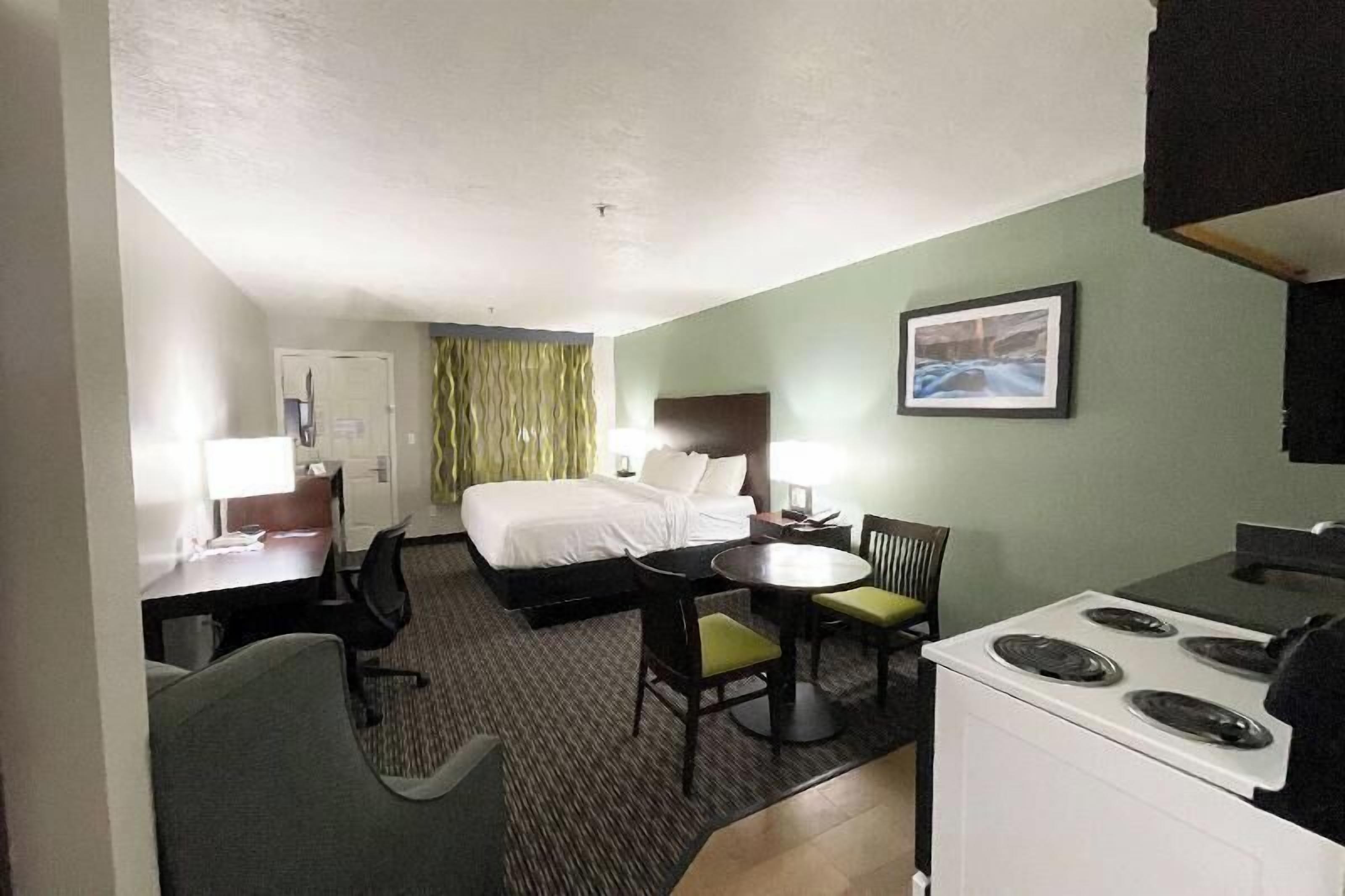 Premium bedding, desk, laptop workspace, soundproofing