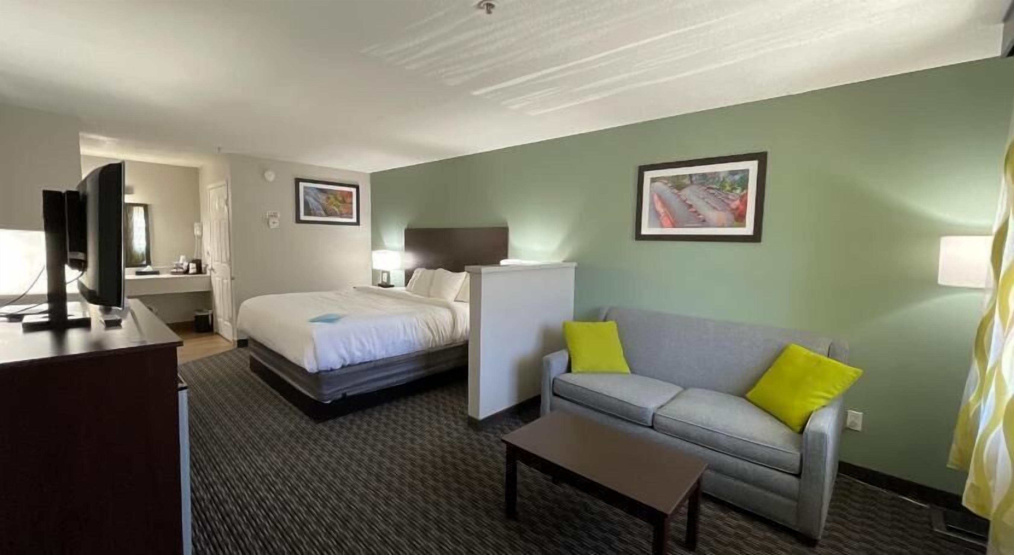 Premium bedding, desk, laptop workspace, soundproofing