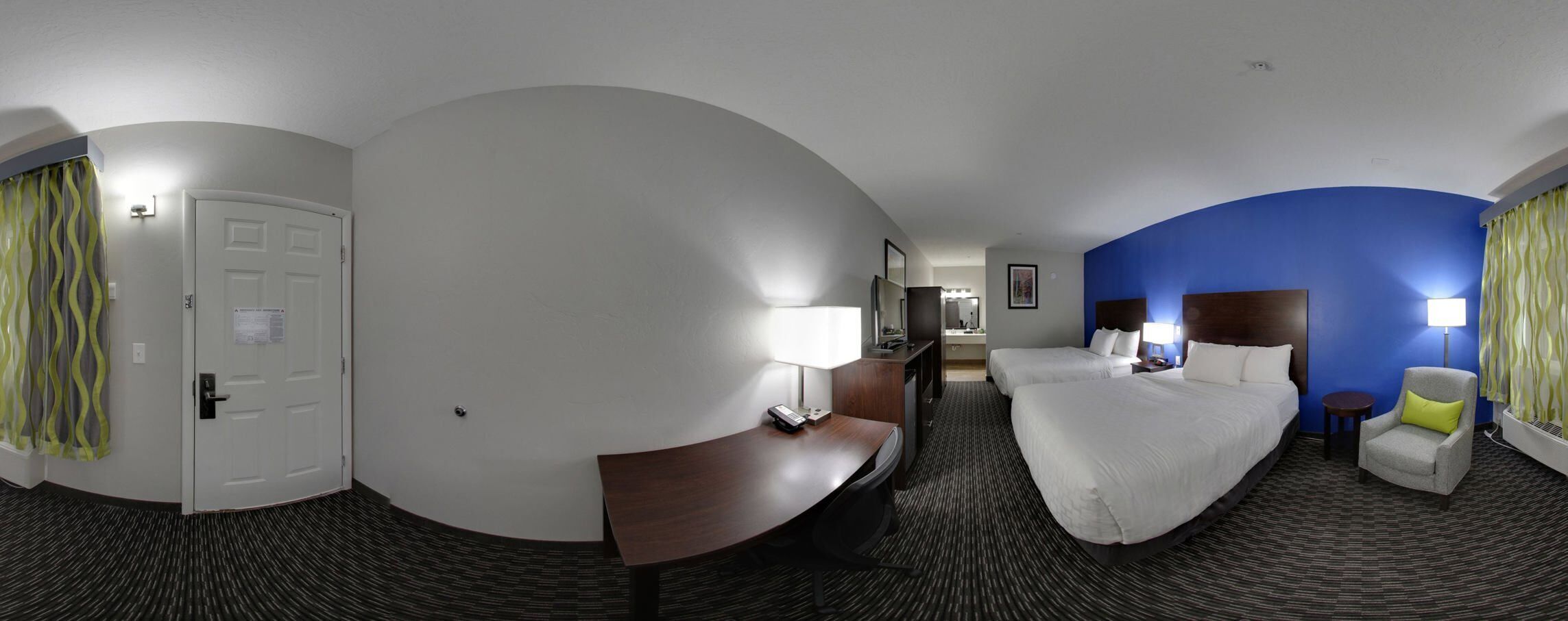 Premium bedding, desk, laptop workspace, soundproofing
