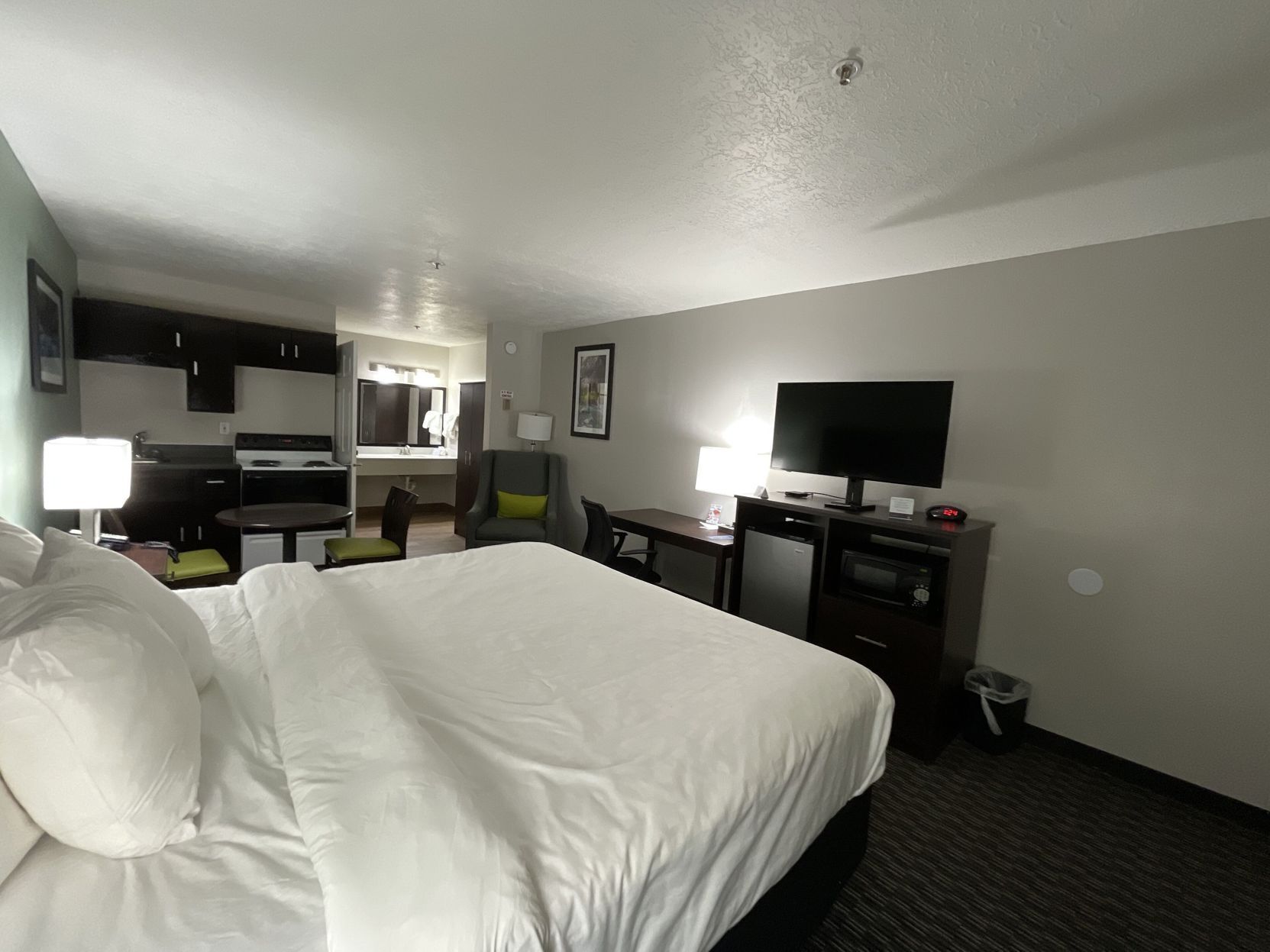 Premium bedding, desk, laptop workspace, soundproofing
