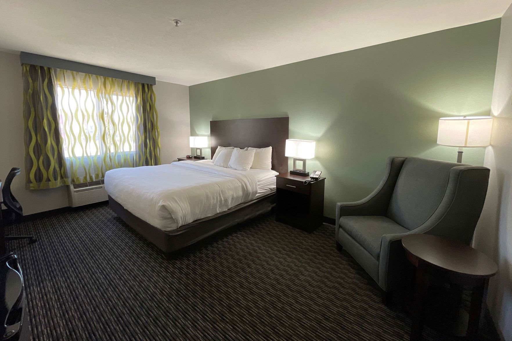 Premium bedding, desk, laptop workspace, soundproofing
