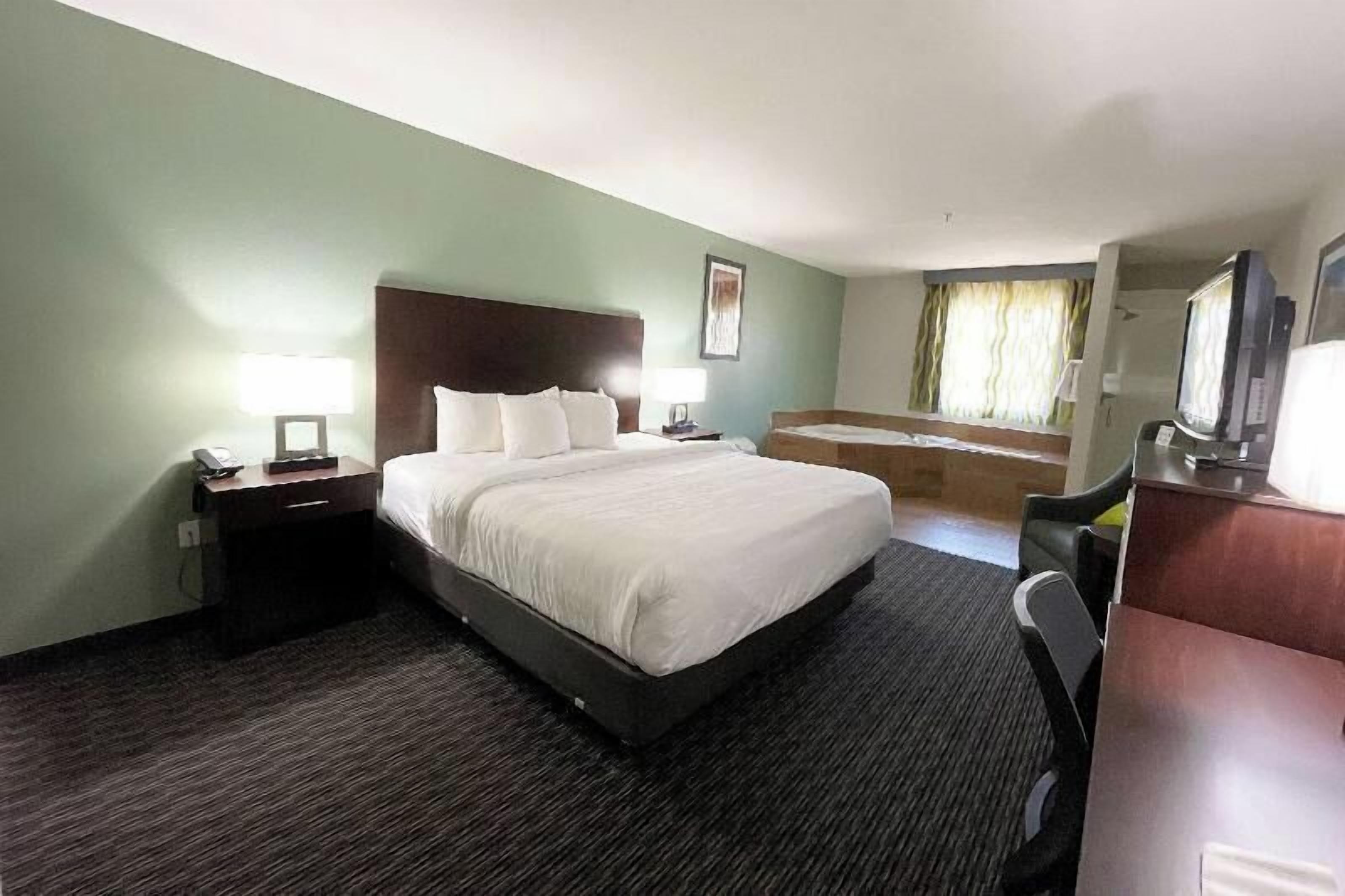 Premium bedding, desk, laptop workspace, soundproofing
