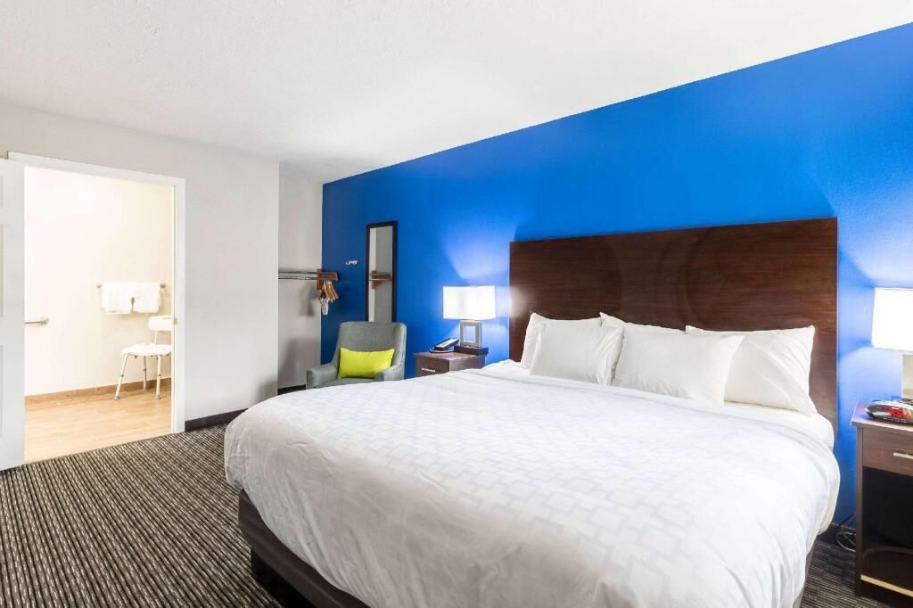 Premium bedding, desk, laptop workspace, soundproofing