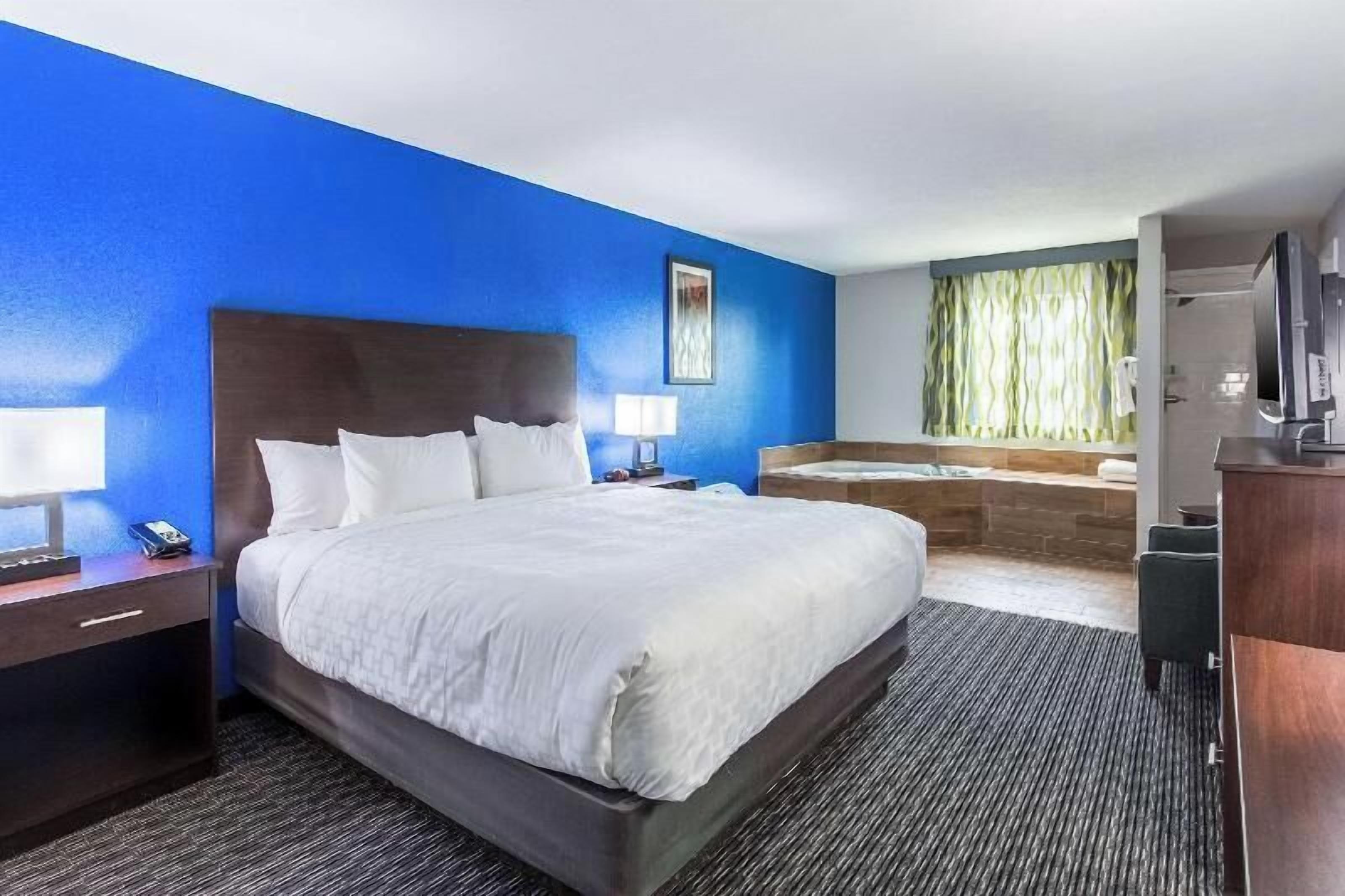 Premium bedding, desk, laptop workspace, soundproofing