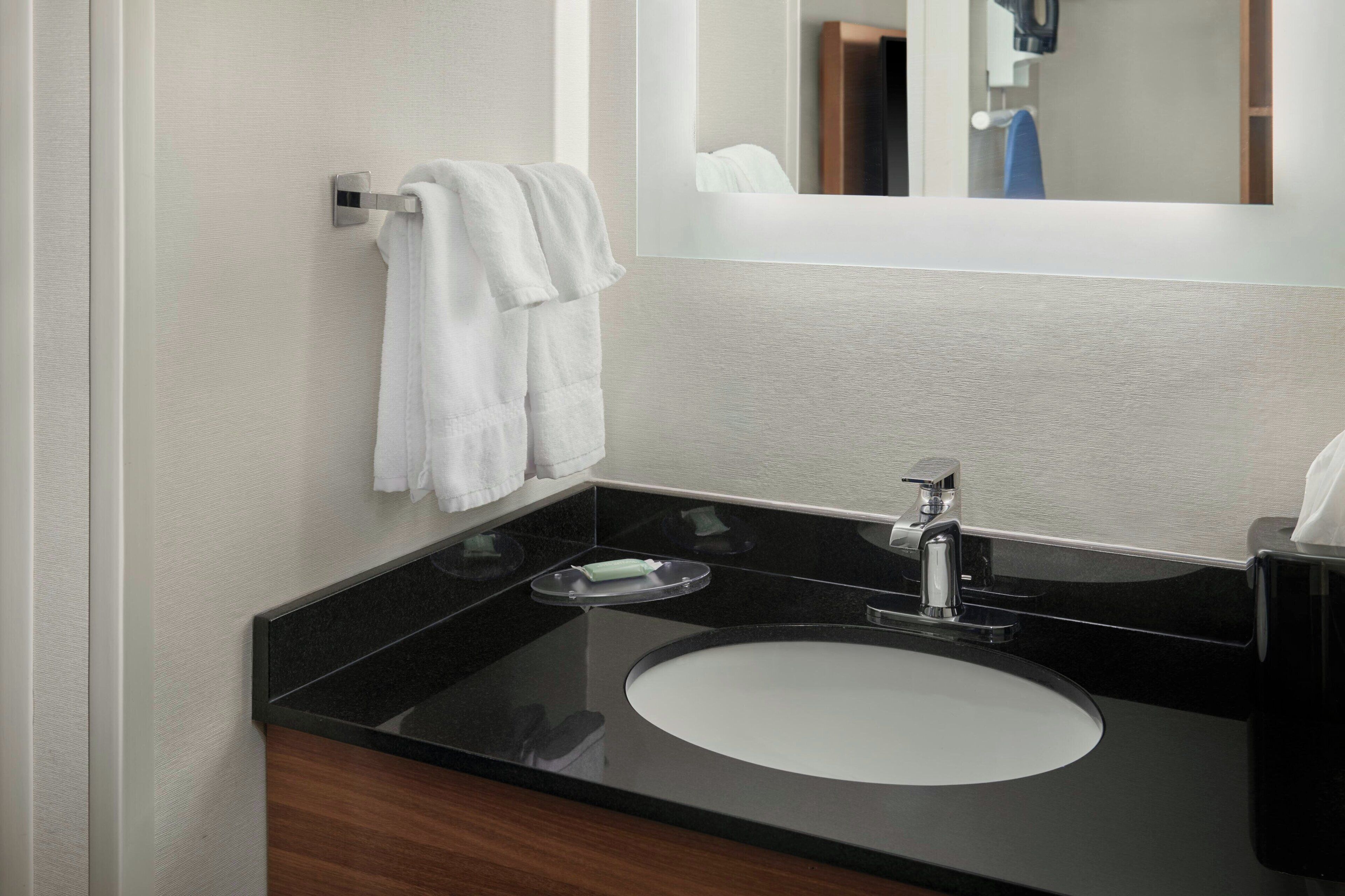 combined shower/bathtub, free toiletries, hair dryer, towels