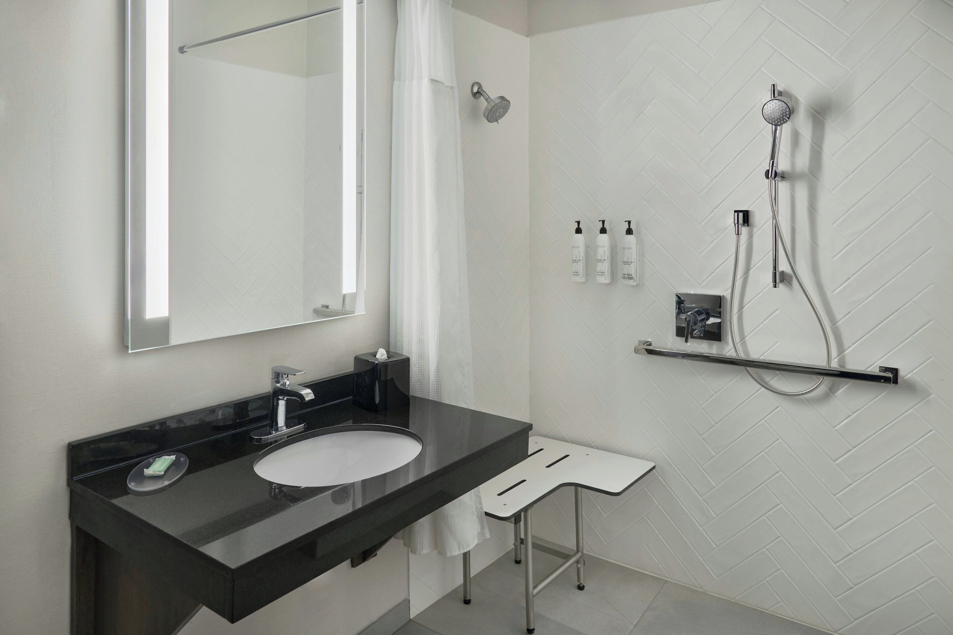 combined shower/bathtub, free toiletries, hair dryer, towels