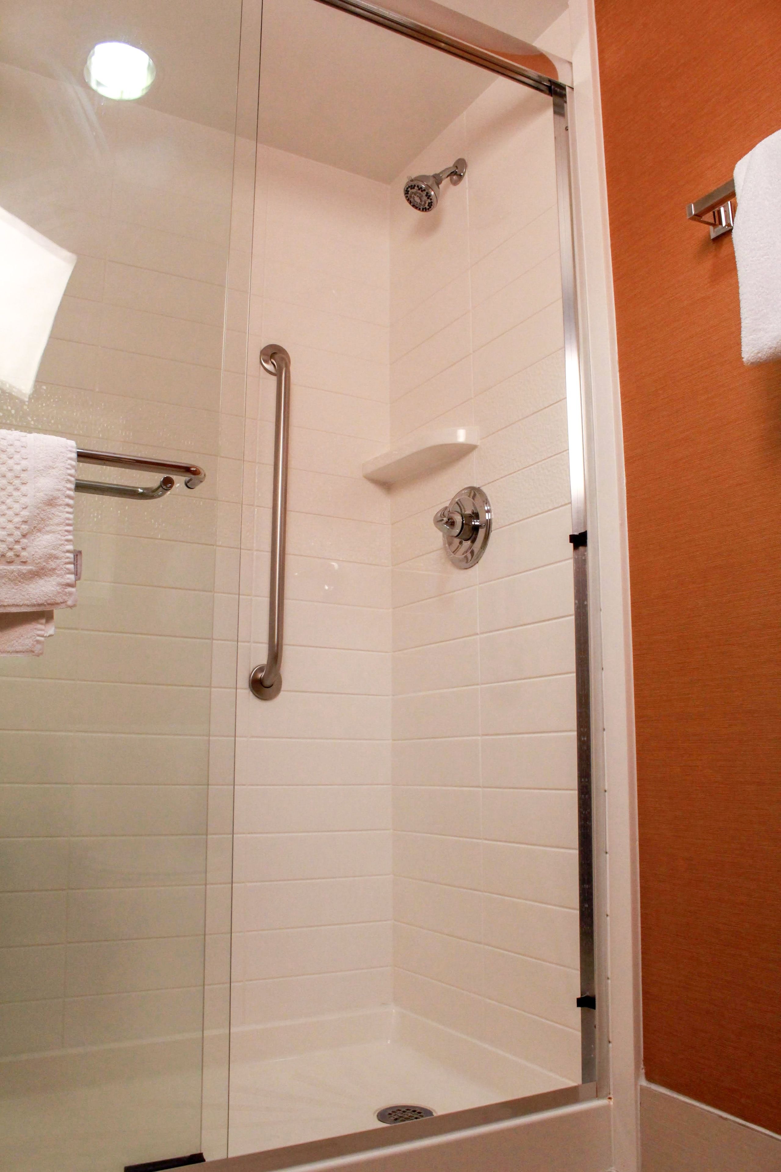 combined shower/bathtub, free toiletries, hair dryer, towels
