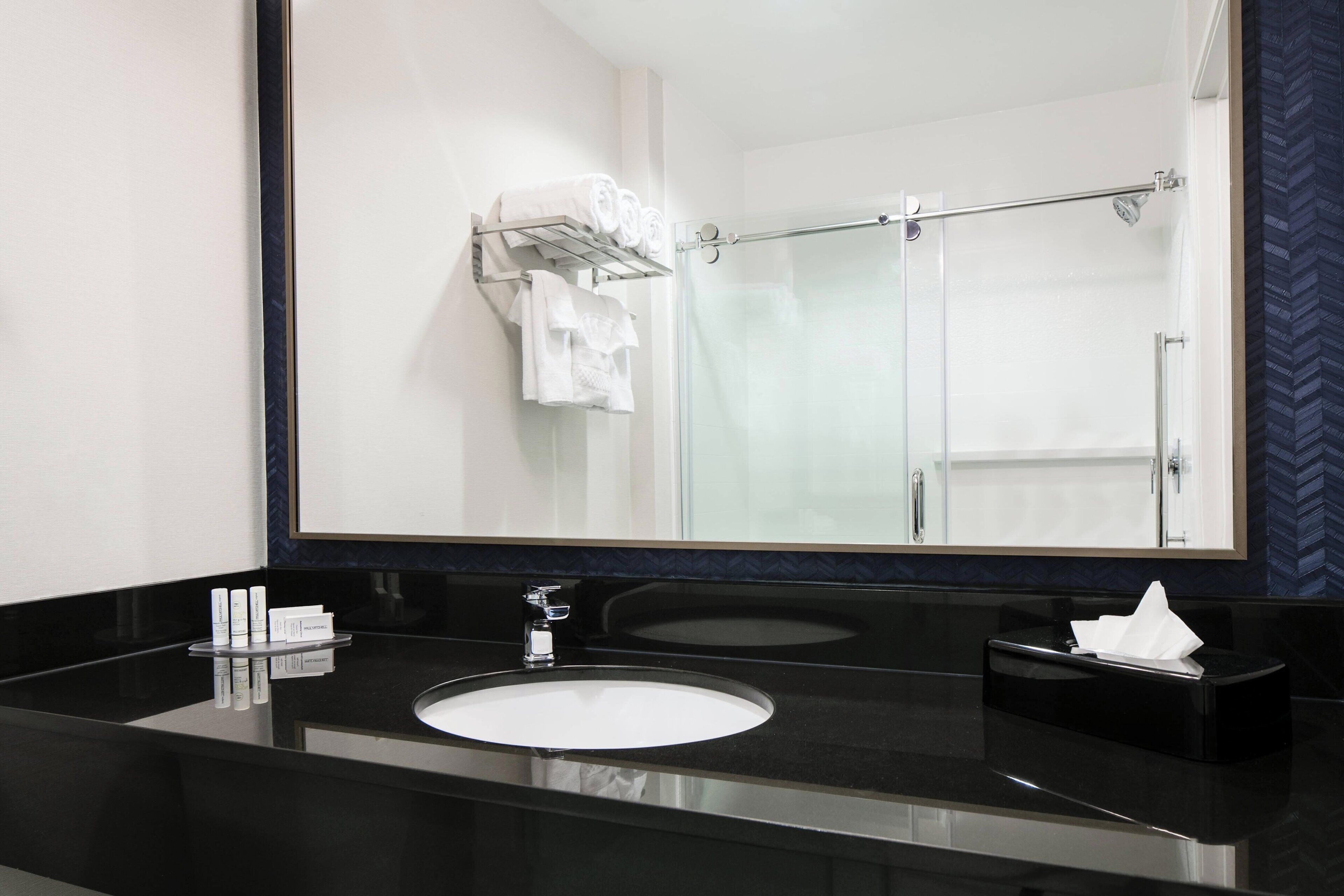 combined shower/bathtub, hair dryer, towels, soap