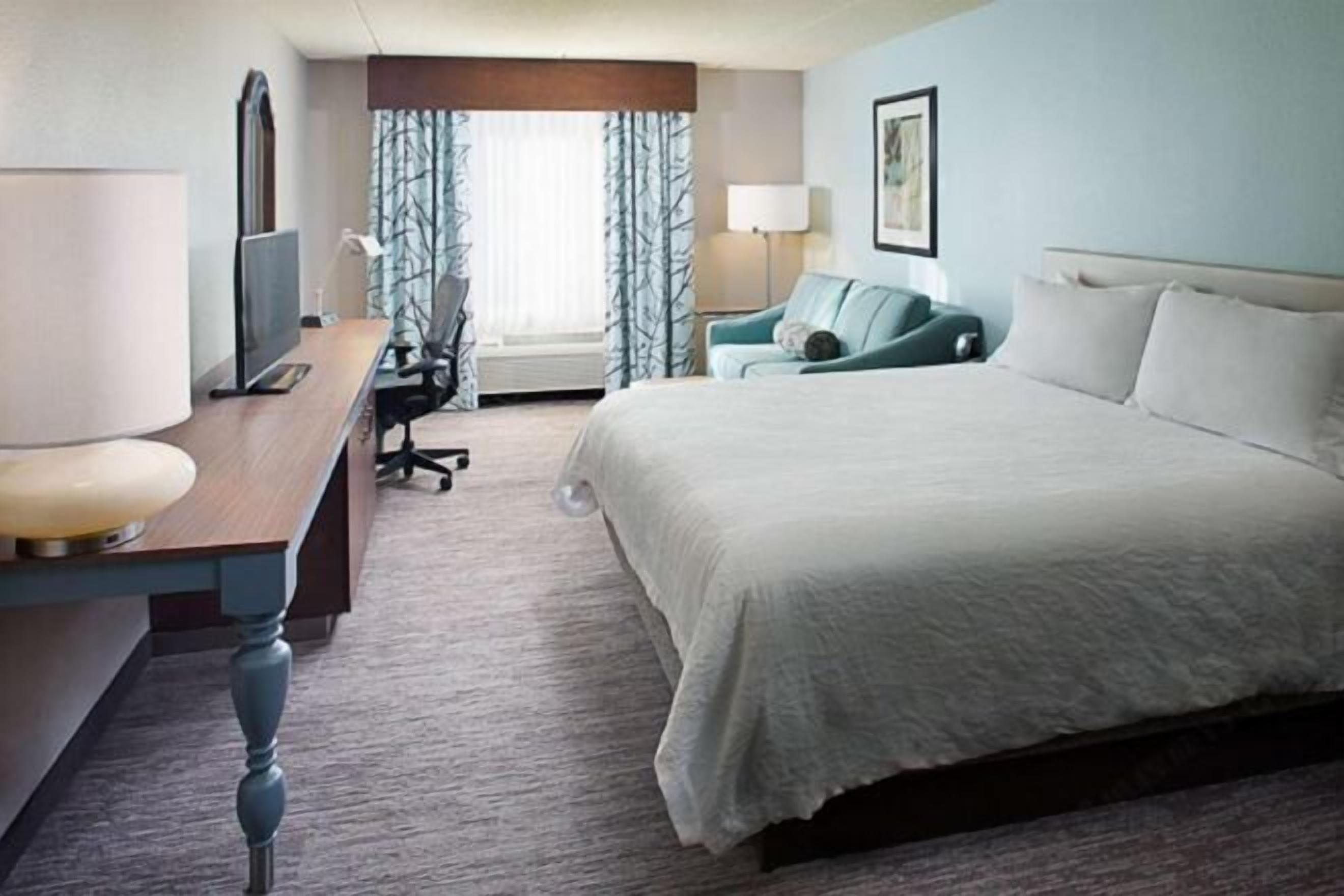 Down comforters, desk, laptop workspace, blackout drapes