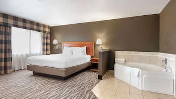 Suite, 1 King Bed, Non Smoking, Jetted Tub | Desk, blackout drapes, iron/ironing board, free WiFi