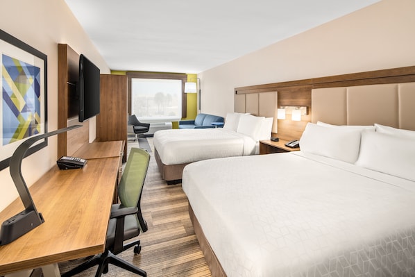 A hotel room with two beds, a desk with a chair, a television, and a window with a view. - Holiday Inn Express Ft. Lauderdale Cruise-Airport by IHG (Fort Lauderdale)