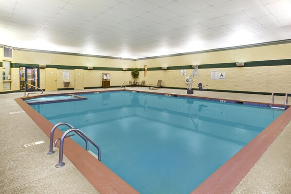 Indoor pool, open 6:00 AM to 11:00 PM, pool loungers
