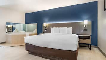 Suite, 1 King Bed, Non Smoking, Jetted Tub | Desk, iron/ironing board, free cots/infant beds, rollaway beds