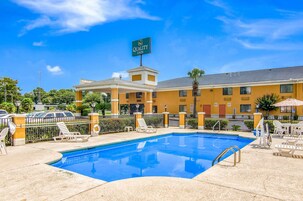 Seasonal outdoor pool, open 8 AM to 10 PM, pool umbrellas, sun loungers