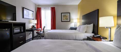 Premium bedding, pillowtop beds, desk, laptop workspace