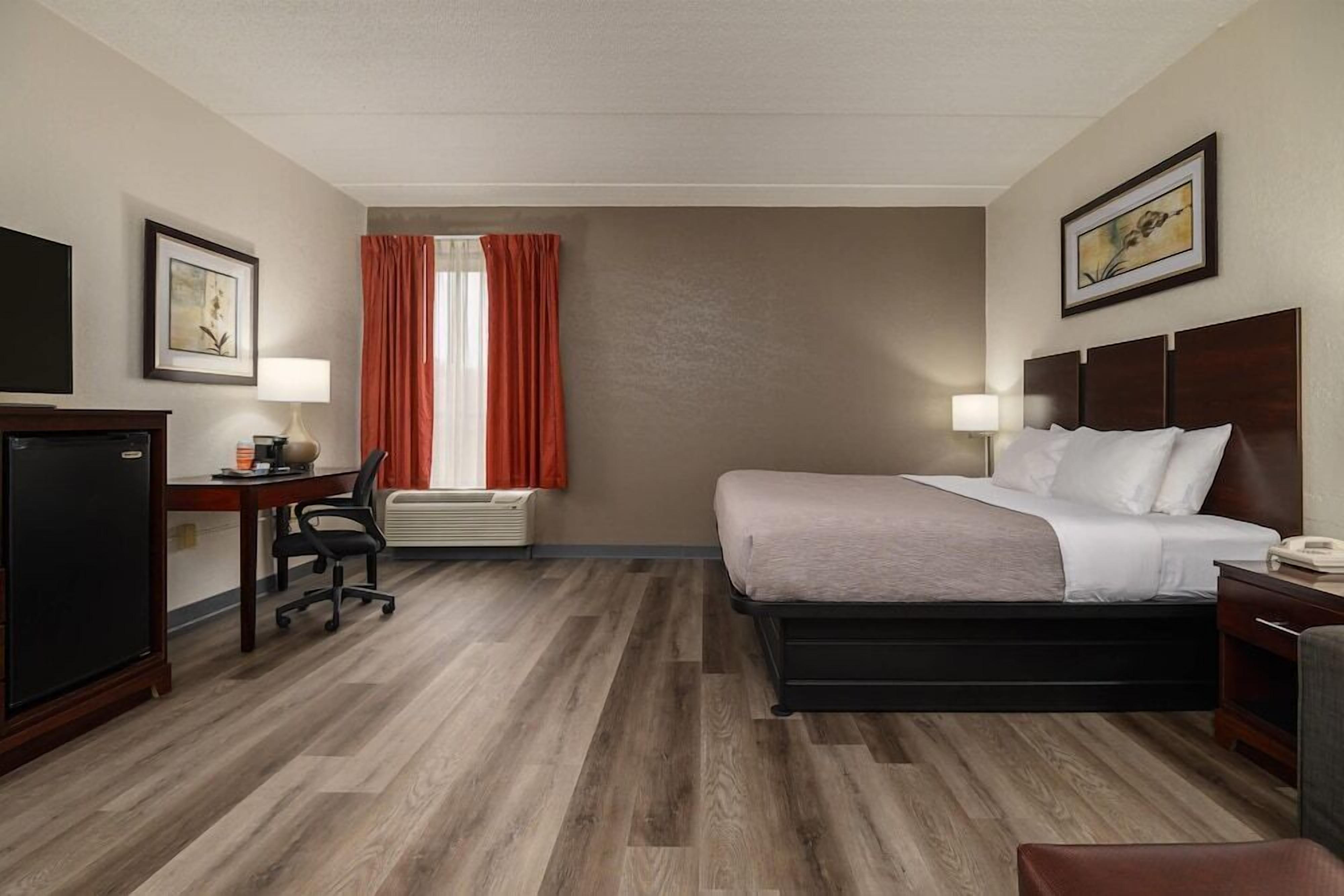 Premium bedding, pillowtop beds, desk, laptop workspace
