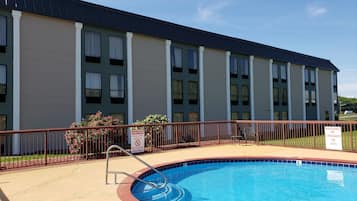 Seasonal outdoor pool, open 10:00 AM to 8:00 PM, pool umbrellas