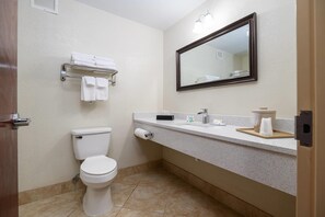 Premium bedding, pillow-top beds, desk, laptop workspace