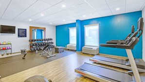 A gym with treadmills, dumbbells, and exercise equipment. - Hampton Inn Slidell (Slidell)