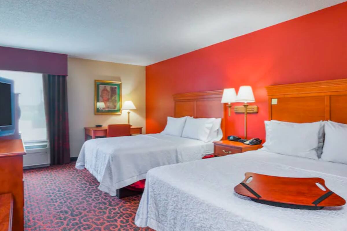 desk, laptop workspace, blackout curtains, iron/ironing board