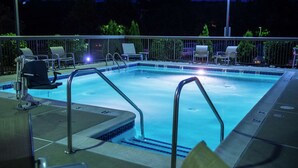 A swimming pool with lounge chairs and a deck area. - Hampton Inn Philadelphia/Great Valley/Malvern (Malvern)