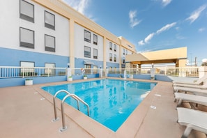 Seasonal outdoor pool, open 7:00 AM to 10 PM, pool loungers