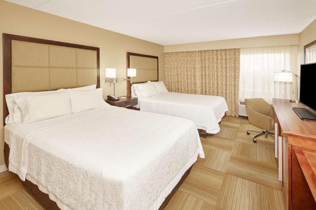 Premium bedding, desk, blackout drapes, iron/ironing board