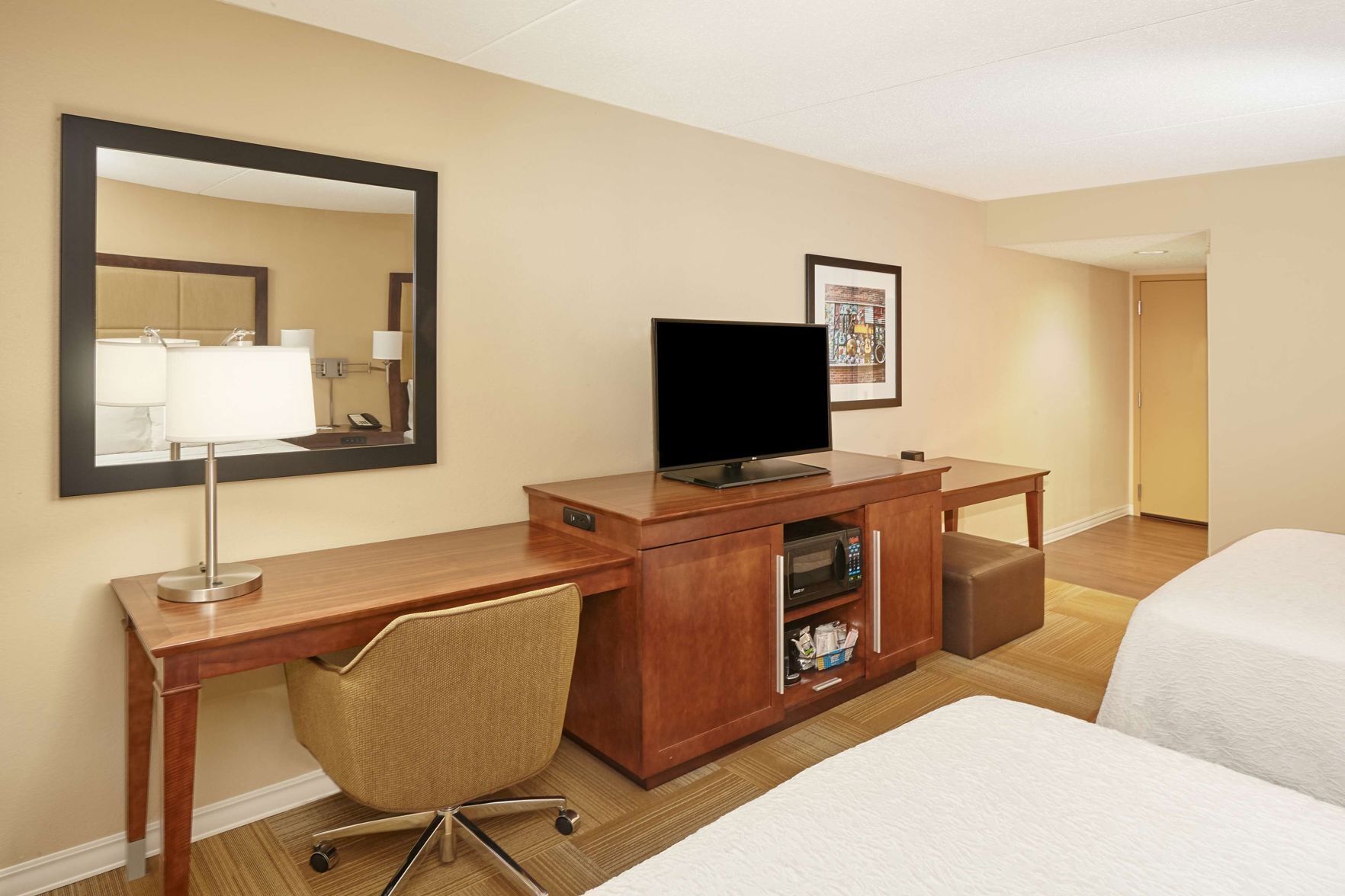 Premium bedding, desk, blackout drapes, iron/ironing board