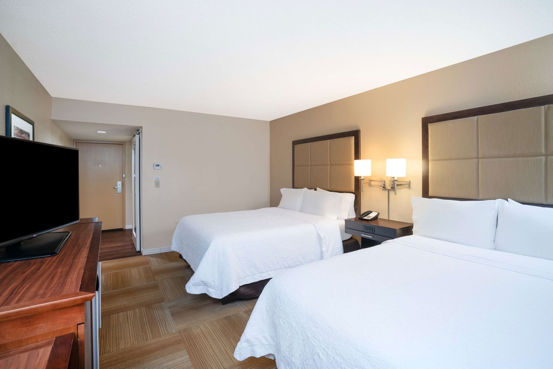 Premium bedding, desk, blackout drapes, iron/ironing board