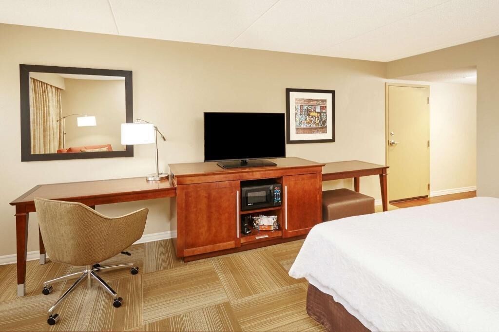 Premium bedding, desk, blackout drapes, iron/ironing board