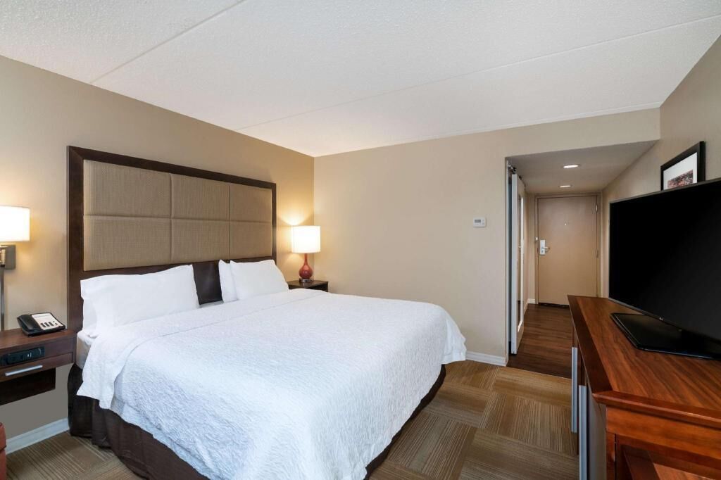 Premium bedding, desk, blackout drapes, iron/ironing board
