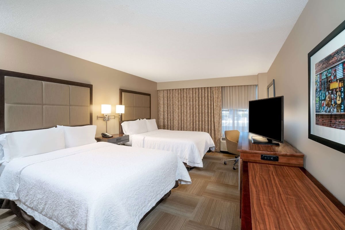 Premium bedding, desk, blackout curtains, iron/ironing board