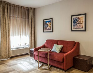 Suite, 1 King Bed, Non Smoking | Living area | 42-inch LCD TV with satellite channels, TV